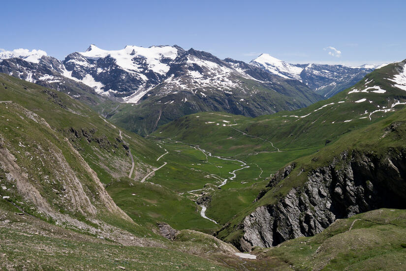 View down towards Bonneval-sur-Arc while descending from the col