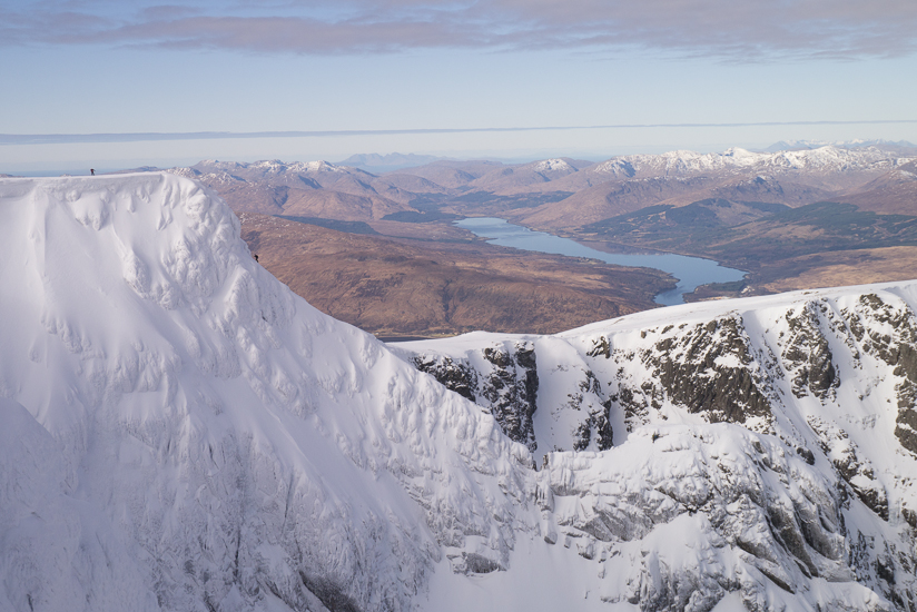 Climbers on Tower Ridge with the Cuillins in the background