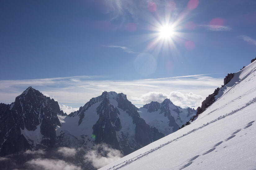 Sun behind the Aiguille d'Argentiere