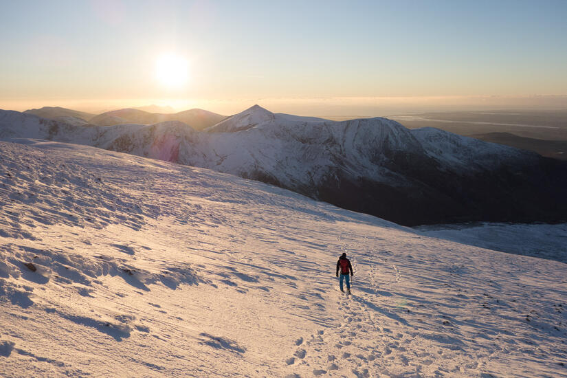 Descending into the sunset from Carnedd Dafydd