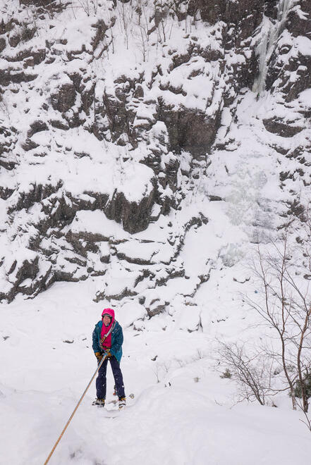 Becky abseiling back down