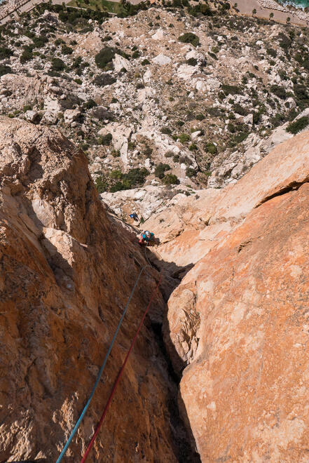 Climbing the first crux pitch