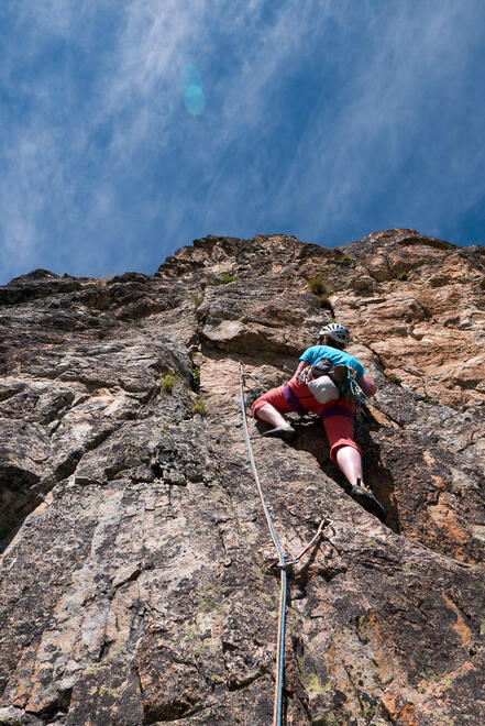 Becky leading up sunkissed rock